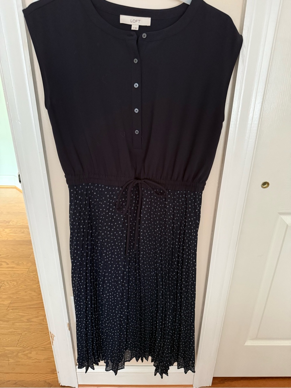 Loft Navy dress with drawstring waist and pleated bottom. Fully lined.